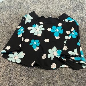 Justice black and blue floral skirt